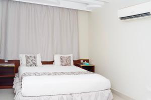 Letto o letti in una camera di Palette Muscat Al Bayrahaa