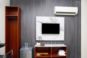 TV o dispositivi per l'intrattenimento presso Palette Muscat Al Bayrahaa