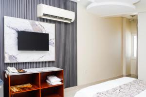 TV o dispositivi per l'intrattenimento presso Palette Muscat Al Bayrahaa