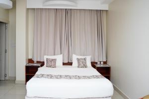 Letto o letti in una camera di Palette Muscat Al Bayrahaa