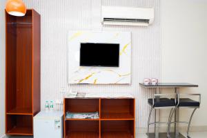 TV o dispositivi per l'intrattenimento presso Palette Muscat Al Bayrahaa