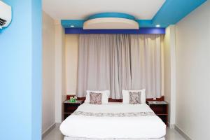 Letto o letti in una camera di Palette Muscat Al Bayrahaa