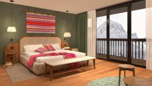 a bedroom with a bed and a view of a mountain at Hotel Kristberg in Lech - New hotel with Spa - opening Dezember 4th, 2025 in Lech am Arlberg +52 photos