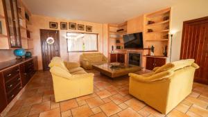 A television and/or entertainment centre at VILLA CANTARES