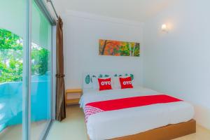 Postel nebo postele na pokoji v ubytování Koh Lak Resort