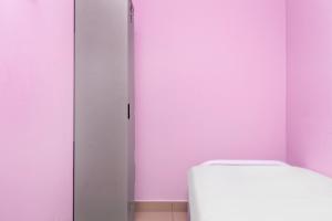 Postel nebo postele na pokoji v ubytování City Hostel Ipoh