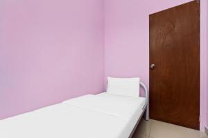 Postel nebo postele na pokoji v ubytování City Hostel Ipoh + 24 fotografií