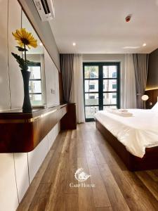 Postel nebo postele na pokoji v ubytování Carp House Phú Quốc