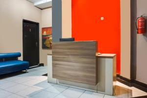 Χώρος καθιστικού στο Hotel O Makassar near Mall Panakukkang formerly Sayang Home Stay