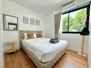 Postel nebo postele na pokoji v ubytování V Villa Khaoyai + 27 fotografií