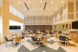 Posezení v ubytování Keys Prima by Lemon Tree Hotels, Pimpri, Pune