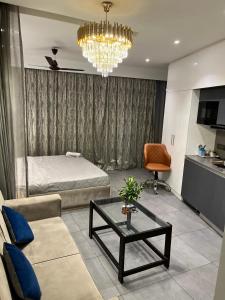 Posezení v ubytování Supernova Noida