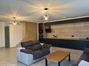 Posezení v ubytování Chambre d'hôtes AU CHAUVET