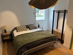 Postel nebo postele na pokoji v ubytování Chambre d'hôtes AU CHAUVET