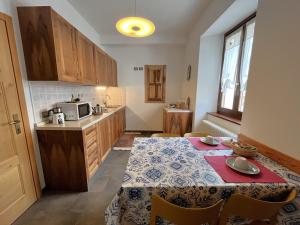 Kuchyň nebo kuchyňský kout v ubytování B&B Casa Taralin