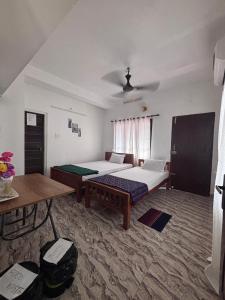 Postel nebo postele na pokoji v ubytování Hornbill inn