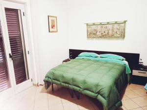 Llit o llits en una habitació de Torre Ancinale