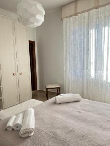 Кровать или кровати в номере Radames House