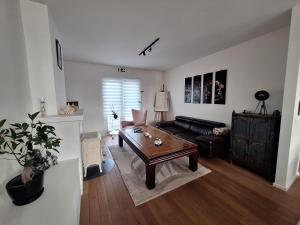 Posezení v ubytování B&B De Lelie