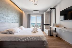 Posteľ alebo postele v izbe v ubytovaní CentralViewSuites