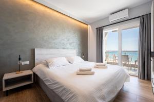 Posteľ alebo postele v izbe v ubytovaní CentralViewSuites