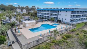 an aerial view of a resort with a pool at Beach-Pool-Private Balcony in Tybee Island