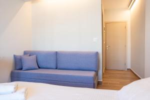 Posteľ alebo postele v izbe v ubytovaní CentralViewSuites