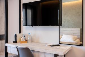 TV a/nebo společenská místnost v ubytování CentralViewSuites