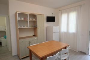 Kuchyň nebo kuchyňský kout v ubytování Villa Manu appartamento 01