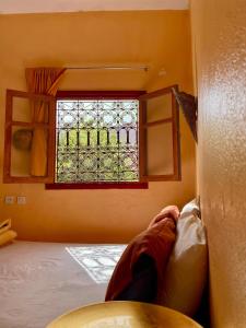 Voodi või voodid majutusasutuse Dar Relax Hostel, Gorges de Todra toas