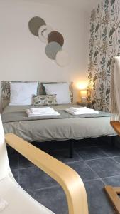 Ένα ή περισσότερα κρεβάτια σε δωμάτιο στο Appartement Lumineux hypercentre - Biscarrosse