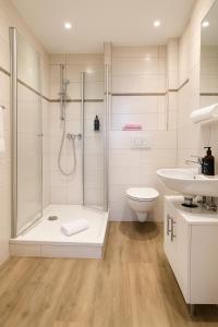 Koupelna v ubytování Hotel Schultheiss Hameln + 37 fotografií