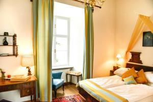 Voodi või voodid majutusasutuse Schloss Kapfenstein toas