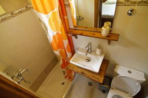 Koupelna v ubytování Mango Rooms