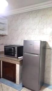 Kuchyň nebo kuchyňský kout v ubytování Relaxation and Comfort