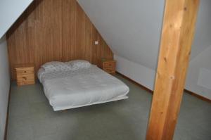 Postel nebo postele na pokoji v ubytování Chambre meublée en duplex indépendante