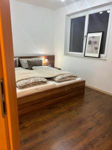 Rúm í herbergi á Bergnest Apart 1 +2 myndir