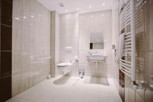 Kúpeľňa v ubytovaní Elixír Medical Wellness Hotel