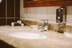 Kúpeľňa v ubytovaní Elixír Medical Wellness Hotel