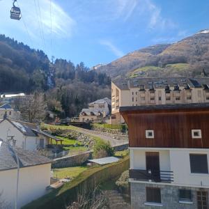 a view of a town with a gondola at Joli T2 avec alcôve Wifi 4 pers linge de maison inclus in Cauterets +5 photos