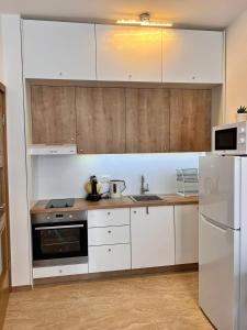 Kuchyň nebo kuchyňský kout v ubytování Pretty apartment near the sea! + 2 fotografie