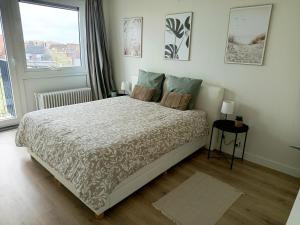 Postel nebo postele na pokoji v ubytování Fall For Kortrijk