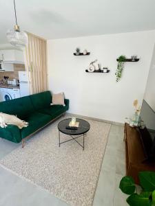 Posezení v ubytování Joli appartement lumineux et calme