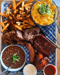 a plate of food with different types of food at Smokehouse Suites and Stay in Guelph +12 photos