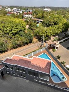 an overhead view of a building with a swimming pool at Marina Beachfront at JUMEIRAH PALM RESORT-NYALI in Mombasa