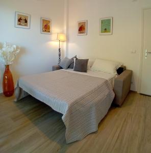 Postel nebo postele na pokoji v ubytování Le Mimose Terrace
