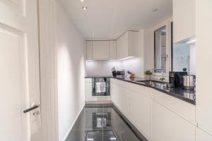 A cozinha ou kitchenette de Boho Suite
