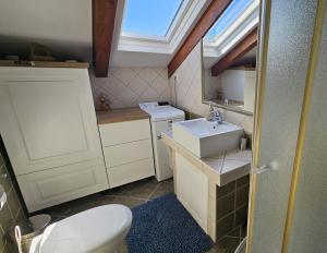 Kúpeľňa v ubytovaní Viktorija Apartments