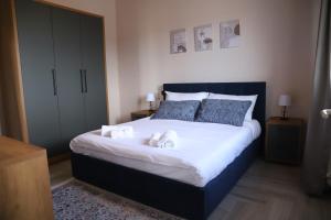 Postel nebo postele na pokoji v ubytování Endrit Accommodation