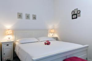 Ein Bett oder Betten in einem Zimmer der Unterkunft Apartments Kala & Kaleta